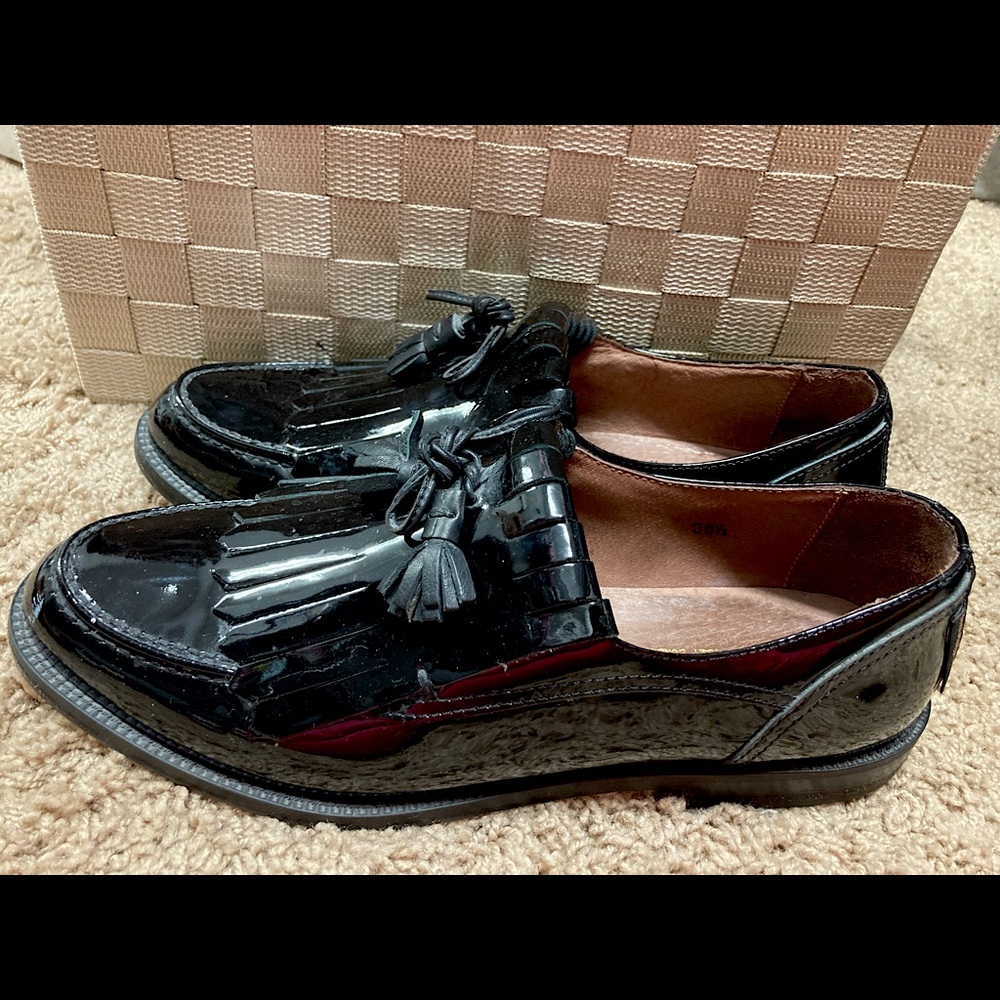 Russell and Bromley black loafers with tassels